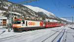 Coop Ge 4/4 III 641 mit RE 1129 bei Einfahrt in Samedan. An erster Stelle ist ein B (Nr. 2306) Mitteleinstieg des Typs Fliegender Rhtier, 25.01.2013.