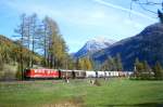 RhB Gterzug 5552 von St.Moritz nach Landquart am 15.10.1999 im Val Bever zwischen Bever und Spinas mit E-Lok Ge 6/6 II 707 - 2x Gbkv - 2x Uace - 4x Uce - A - 3x Rpw. Hinweis: gescanntes Dia
