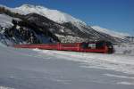 Ge 4/4 III 648 zieht am 12.01.2014 den RE 1141 von Samedan Richtung St.