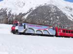 Ge 4/4 III 650 mit ein RE zug Chur - Sankt-Moritz, zwischen Bever und Samedan,    28-01-2015