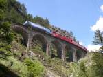 Mitten auf der  Alpenachterbahn  ist hier Ge 4/4 III 647  Grsch  am 14.06.2006 unterwegs.