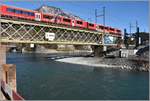 Baustelle 2. Hinterrheinbrücke in Reichenau-Tamins. IR1136 aus St.Moritz mit ABe 8/12 3514. (15.01.2018)