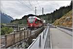 IR1137 mit ABe 8/12 3501 nach St.Moritz überquert den Hinterrhein bei Reichenau-Tamins. (21.07.2018)