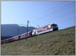 Ge 4/4 III 651  Fideris  fhrt mit RegioExpress nach St.Moritz, hier nach der Verzweigung bei Reichenau-Tamins. (20.06.2007)