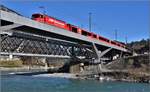 IR1136 nach Chur mit der Ge 4/4 III 646  Grüsch  benützt die neue Hinterrheinbrücke. (05.12.2019)