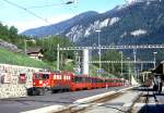 RhB Schnellzug BERNINA-EXPRESS D 500 von Tirano nach Chur am 15.05.1994 in Tiefencastel mit E-Lok Ge 6/6II 707 und EW-IV-Kompo. Hinweis: Lok hat noch Scherenpantograf.