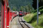 Zugkreuzung in Sils. Entgegen kommt Ge 4/4 III 642 mit dem Schnellzug von St. Moritz nach Chur. (Aufnahme 07.07.2010)