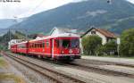 Eine S1 nach Rhzns am 10.8.2013 in Bonaduz mit dem fhrenden ABt 1716. Dieser Steuerwagen fuhr im Jahre 2009 gegen einen Erdrutsch und wurde erheblich beschdigt, aber durch die RhB-Werksttte wieder aufgebaut. Dabei erhielt er einen neuen Anstrich, der bereits bei den Allegras verwendet wurde.