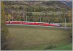 RE1144 mit Ge 4/4 III 646  Sta.Maria/Val Müstair  bei Campagna zwischen Bonaduz und Reichenau-T. (30.10.2014)