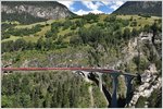 RE1129 mit Ge 4/4 III 641  Maienfeld  auf dem Landwasserviadukt. (16.07.2016)