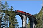 RE1125 mit der Ge 4/4 III 651  Fideris  nach St.Moritz auf dem Landwasserviadukt.