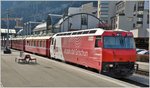 Der RE1128 nach Chur mit Ge 4/4 III 645  Tujetsch  kreuzt uns in Thusis.