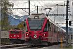 Ge 6/6 II 703  St.Moritz  und S2 1566 mit ABe 4/16 3103 in Felsberg.