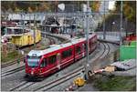 S2 1553 mit ABe 4/16 3104 auf dem frisch verlegten Gleis zur neuen Hinterrheinbrücke in Reichenau-Tamins.