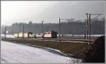 Ge 6/6 II 705  Pontresina/Puntraschigna  mit einem Güterzug zwischen Felsberg und Chur. (11.02.2015)