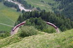 ABe 8/12 3514  Steivan Brunies  hat mit seinem R1633 (St.Moritz - Tirano) die Stablini-Kurve unterhalb Alp Grüm erreicht.

Alp Grüm, 13. Juni 2017