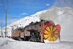 RhB Dampfschneeschleuderfahrt 2018 
Das Bernina Krokodil Ge 4/4 Nr. 182 und die RhB Xrotd Nr. 9213 mit dem offener  Mototklappe  im Bahnhof Ospizio Bernina.

Im Bild sieht man durch die offenen  Klappen  das  Herz  der Dampfschneeschleuder, der den Schleuderrad antreibt. Der Durchmesser des Schleuderrads beträgt zweieinhalb Meter und der kann mit maximal 170 Umdrehungen pro Minute drehen! Damit können bis zu drei Meter hohe Schneemassen beseitigt werden.

Sonntag, 28. Januar 2018