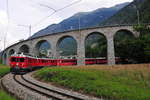 R1652 mit ABe 4/4 III 55  Diavolezza  und  56  Corviglia  bei der Ausfahrt aus dem Kreisviadukt von Brusio am 23.08.2018