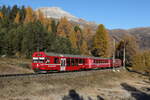 BDt 1753 war am Morgen des 27. Oktober 2021 bei  Punt Muragl  in Richtung  Pontresina  unterwegs.