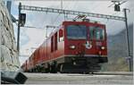 Die RhB Gem 4/4 801 und ein ABe 4/4 II sind mit einem Bernina Regionalzug auf dem Weg nach St.