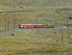 RhB - Gelber Triebwagen ABe 4/4  30 mit Personenzug unterwegs nach St.Moritz