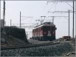 Die beiden Triebwagen fahren leer zurck nach Pontresina. Gegenlichtaufnahme im Bahnhof Ospizio Bernina, der zur Zeit total umgebaut und erweitert wird. (10.09.2008)