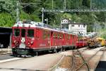 RhB - Bernina- Express 951 von Chur nach Tirano am 19.07.2009 Einfahrt Poschiavo mit Triebwagen ABe 4/4 II 45 + ABe 4/4 II 49 - Ap 1292 - Api 1302 - Bps 2515 - Bp 2521 - Bp 2522 - Bp 2526  