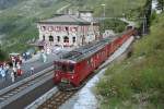 Zug nach Tirano, gefhrt vom ABe 4/4 47, fhrt in Alp Grm ein. August 1990. Gescanntes Farbnegativ. 