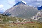 RhB Regionalzug 1638 von Tirano nach St.Moritz am 26.08.2008 im 70-Promille-Geflle auf Oberer Berninabach-Brcke mit Triebwagen ABe 4/4 III 53 - ABe 4/4 II 43 - BD 2478 - AB 1545 - B 2465 - B 2453 -