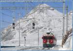 ABe 4/4 III 52  Brusio  und 56  Corviglia  erreichen mit R1621 die Station Ospizio Bernina 2253m.