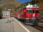 ABe 4/4 III Nr. 54 Hakone + Nr. 52 Brusio kurz vor der Abfahrt in Alp Grm Richtung Poschiavo-Tirano, 11. Okt. 2009, 12:02