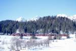 RhB BERNINA-EXPRESS Winter 425 von St.Moritz nach Tirano am 10.03.1998 bei Punt Muragl mit Triebwagen ABe 4/4II 44 - B - B - B. Hinweis: Kurswagen aus Chur werden in Pontresina angekuppelt
