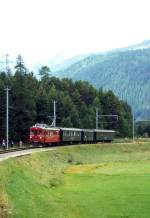 RhB Extra-FOTOZUG 3937 fr RHTIA TOURS von St.Moritz nach Pontresina am 31.08.1996 bei Celerina Station mit Triebwagen ABe 4/4I 35 - B 2247 - D 4052I - B 2246. Hinweis: historische 4-Achser auf der Berninabahn!
