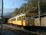 Berninabahn,Histor.Zug mit Triebwagen ABe4 No.30+34 und mit III Kl.
Personenwagen C114 (1910) in der Original Farbgebung und Beschriftung am 27.10.01 in Poschiavo.