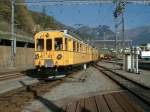 Berninabahn,Triebwagen ABe4 No.34 (1908)in Hist.Farbgebung und beschriftung am 27.10.01 in Poschiavo