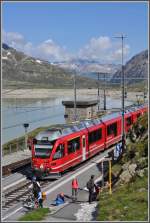 Der R1617 mit ABe 8/12 3503  Carlo Janka  hat die Station Ospizio Bernina 2253m /m. erreicht. (15.06.2011)