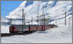 In Bernina Lagalb kreuzt uns R1632 mit ABe 4/4 III 55  Diavolezza  und 54  Hakone . (15.04.2013)