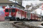 RhB ABe 4/4 III 52  Brusio  und 56  Corviglia  mit dem Regio nach Tirano in Alp Grüm.