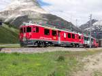 Zwei triebwagen ABe 4/4 III im Hst. Bernina Suot mit ein  Bernina-Express  - 26/06/2014  