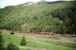 RhB - Regionalzug 425 von St.Moritz nach Tirano am 05.10.1999 zwischen Miralago und Brusio mit Triebwagen ABe 4/4 II 44 + ABe 4/4 II 43 - BD 2454 - AB 1544 - B 2456 - B 2310 - Rw 8383 - Hinweis: gescanntes Dia
