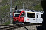 R1613 mit ABe 8/12 3512 nach Tirano beim Halt in Alp Grüm. (18.07.2016)