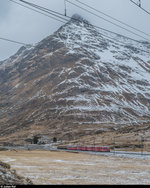 RhB Allegra ABe 8/12 3503  Carlo Janka  ist am 20. Dezember 2016 mit dem Regio 1633 St. Moritz - Tirano zwischen Bernina Diavolezza und Bernina Lagalb unterwegs. Am Zugschluss hängen drei Heizölkesselwagen.