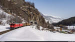 RhB Ge 4/4 I 605 und 610 mit Güterzug 5329 Chur - Samedan am 24. Februar 2021 bei der Ausfahrt aus dem Vereinatunnel bei Sasslatsch.