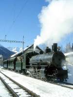 RhB DAMPFZUG fr GRAUBNDEN TOURS 3723 von St.Moritz nach Scuol am 02.03.1997 in Cinuos-che-Brail mit Dampflok G 4/5 108 - A 1102 - B 2060 - D 4052I - B 2245.
