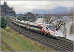 Goehte im Doppeltpack: Der EC 34 wird an einem trüben, aber wie meist am Genfersee Schnee freien Wintertag mit dem SBB RABe 503 022-7  Johann Wolfgang Goethe  geführt.