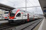 RABe 511 023 KISS wartet am 12.02.2024 beim Bahnhof Brugg.