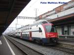 RABe 514 022-3  Frauenfeld-Weinfelden  bei der Einfahrt in Uster am 3.03.09