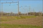 Doppelstocktriebzug der Zürcher S-Bahn 514 007-4 kurz nach Verlassen der Thurbrücke bei Eschikofen. Februar 2014.