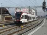 SBB - Triebzug RABe 520 001-4 bei der einfahrt in den Bahnhof Suhr am 01.02.2014