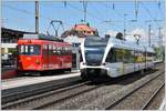 S26 6135 mit BDeh 1/2 1  Liseli  nach Walzenhausen und S2 23252 nach St.Gallen in Rheineck.